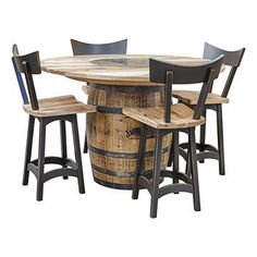 a wooden barrel table with chairs around it