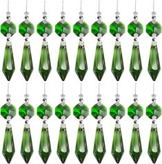 PRICES MAY VARY. PACK OF 20: Package includes 20 pieces optical crystal chandelier prisms. Enough for your spare or replacement. QUALITY MATERIAL: These green icicle prisms are made of crystal glass, with silver Bow tie Connectors, easy to bend to fit your chandelier. SPARKLING IN THE SUN: These crystal u drop prisms are very clear and they do cast rainbows when in the sun. CRYSTAL CURTAIN PENDANTS SIZE: Main bottom prism length: Approx 37mm/1.5inch; Octagon beads: Approx 14mm/0.55inch. As pictu Silver Bow Tie, Green Chandeliers, Crystal Curtains, Crystal Prisms, Lamp Parts, Prisms, Sculptures & Statues, Lamp Decor, Glass Chandelier