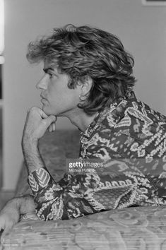 the rolling stones guitarist and singer mick smith poses for a portrait in his hotel room