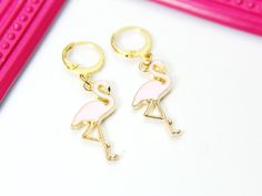 Gold Flamingo Charm Earrings, Flamingo Charm, Pink Bird Jewelry, Miniature Jewelry,  HOW TO ORDER 1) Select the quantity 2) Select style 3) Add to cart DESCRIPTION ♥ 18K Gold over stainless steel ear hook 19-22mm. or 14.5x12mm hoop ♥ Alloy Enamel Pendants approx: 26x14x2.5mm ** Conversion: 1 inch = 25.4mm or 1mm = 0.0393 inches** ♥ Handmade to order, please allow 3-5 days for us to make your item before shipping, ♥ Jewelry comes on Lebua Jewelry card, wrapped in a plastic covering, then placed in a gift bag. *Items will be bag separate.* ♥ All personalization is done by HAND. ♥ Raw materials the USA and international sourcing. ♥ I do not include invoices in any packages unless requested. **Please do not let your child wear without permission or supervision. Be mindful of children's jewelry Enamel Pendants, Miniature Jewelry, Stethoscope Necklaces, Medical Student Gift, Pink Bird, Bird Jewelry, Jewelry Card, Childrens Jewelry, Birthstone Charms