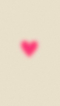 a heart shaped object is shown in the middle of a white and pink background,