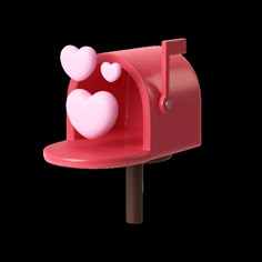 a red mailbox with hearts sticking out of it