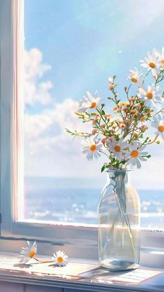 a vase filled with white and yellow flowers sitting on top of a window sill