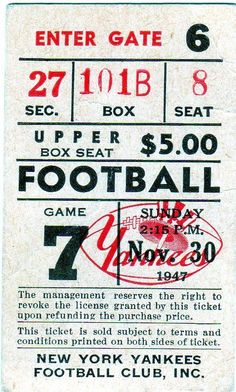 an old football ticket with the number seven on it