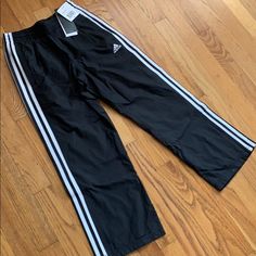 Adidas Nylon Training Pants, Boys S, Nwt. Elastic Waist With Drawstring. Perfect Condition. Track Pants Adidas, Adidas Sports Nylon Pants, Adidas Nylon Sports Pants, Black Nylon Adidas Bottoms, Adidas Black Nylon Bottoms, Casual Adidas Nylon Pants, Casual Nylon Adidas Pants, Adidas Nylon Bottoms For Streetwear, Casual White Nylon Parachute Pants