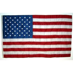 an american flag hanging on the wall in front of a white background with red, white and blue stars