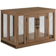 a wooden cabinet with metal mesh doors on the top and bottom, in front of a white background