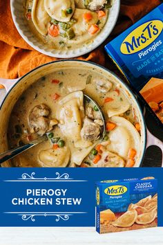 two bowls filled with chicken stew next to a box of potato chips and crackers