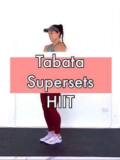 a woman standing in front of a white wall with the words tabata supersets hit