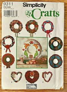 the front cover of simply crafts magazine with wreaths and other items in it on a wooden table