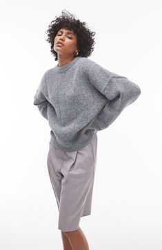 Cozy up in this oversized sweater made with wide-ribbed texture and raised seams that highlight the dropped shoulders. 23 1/2" length (size Medium) Crewneck Long sleeves Dropped shoulders Ribbed cuffs and hem 77% polyester, 23% nylon Machine wash, line dry Imported Rib Sweater, Ribbed Texture, Fabric Gift Bags, Sweater Making, Nordstrom Store, Fabric Gifts, Free Fabric, Oversized Sweater, Ribbed Sweater