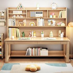 a child's desk and bookshelf in a room