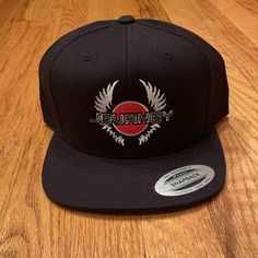 Journey (Rock Band) Authentic Snapback Hat In Black With Adjustable Snap Back. Embroidered Logo. Brand New And Never Worn, In Great Condition. If Interested I Do Have 5 Hats And Will Re-List Them Separately. All Offers Will Be Considered. Black Snapback Hat With Patches, Black Six-panel Snapback Hat, 5-panel Snapback Hat With Logo Patch, Urban 5-panel Snapback Hat For Skateboarding, Black Six-panel Snapback Hat With Logo Patch, Snap Back, Snap Backs, Snapback Hat, Rock Band