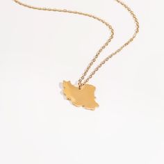 Celebrate your connection to Iran with this beautifully crafted Iran Map Pendant Necklace. The pendant features a detailed silhouette of the country, capturing its unique shape with precision and elegance. Hanging from a delicate chain, this necklace adds a touch of sophistication and charm to any outfit. Perfect for both everyday wear and special occasions, it makes a meaningful and stylish statement. This necklace also serves as a thoughtful gift for anyone with a connection to or appreciation Iran Map, Iran Flag, Map Pendant, Map Necklace, Delicate Chain, Ring Bracelet, Iran, Necklaces Bracelets, Thoughtful Gifts