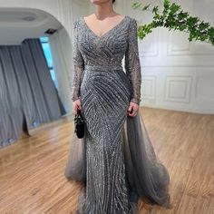 Sapphire Serenity: Elegant Beaded V-Neck Mermaid Gown in Blue Grey Blue Mermaid Gown, Empire Silhouette, Luxurious Dresses, Long Sleeve Evening Gowns, Mermaid Evening Gown, Look Formal, Mermaid Prom Dress, Grey Color Palette, Blue Mermaid