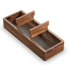 a wooden tray with two compartments on each side