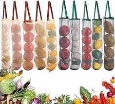 several bags filled with different types of fruits and vegetables next to each other on a white background