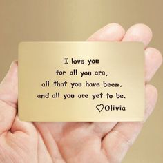 someone is holding up a card that says i love you for all you are, all that you have been, and all you are yet to be