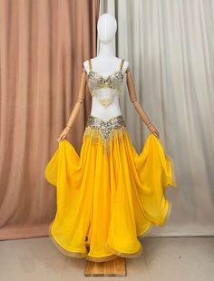 model: #TF1618 Including: bra+belt+skirt Skirt size :  waist fit 32"-42"    ,skirt longe 96-99 cm  maybe there is a little bit color different because of light effect We can make any size。 Very important : Pls note your bra size/under bust/belt lenght when you order,that I can choose the  correct size for you Costume ship from China by USPS, ,and it will be arrive after 15 -25 days. if you want fast arrive , we can shipping by DHL, but need to add more than $38 for shipping charge. And pls send me your TEL NO. DHL company need it. Orange Belly Dance Costume, Samba Costume, Star Costume, Belt Skirt, Belly Dance Outfit, Practice Outfits, Blue Bra, Belly Dance Costume, Belly Dance Costumes