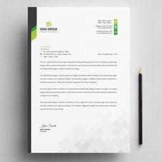 a letterhead and business card on top of a white paper with a pencil next to it