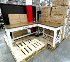 a table with boxes on it in a warehouse