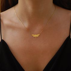 "Enter the enchanting world of the nocturnal with our Moth Necklace for the holiday season. This piece isn't just a necklace; it's a tribute to the mysterious and delicate beauty of moths, making it a sought-after item in the realm of Moth Jewelry. The intricate details on the Moth Wings Necklace capture the essence of moonlit nights and the quiet flutter of wings, ensuring you're not just wearing a piece of jewelry, but a captivating story. Immerse yourself in a world of gothic allure and let your style soar this holiday season. PRODUCT DETAILS: * Choose of Material: 925 Sterling Silver, 14K Solid Gold (real solid gold, no gold-filled or no gold plated material) * Choice of Gold Color: Yellow Gold, Rose Gold, White Gold * Closure: Spring ring * Chain style: Cable * Style: Minimalist M O R Insect Jewelry Gold, Location Names, Insects Jewelry, Moth Jewelry, Christmas Gift Her, Open Necklace, Moth Pendant, Dangle Cross Earrings, Moth Necklace