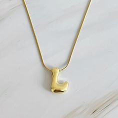 Introducing our unique and fashion-forward Balloon Letter Initial Necklace. With its simple yet chic design, this necklace is the perfect accessory for any outfit. Made with quality materials, it is the perfect combination of style and sophistication. 16" with a 2" extender 18k gold plated brass for pendant, gold plated stainless steel chain Lead and Nickel free Made in China Initial Necklace Gold, Hair Setting, Letter Balloons, Pendant Gold, Letter Necklace, Steel Jewelry, Stainless Steel Jewelry, Initial Necklace, Stainless Steel Chain