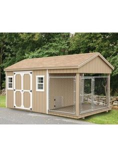 a small dog house with a large door and windows on the side of the building