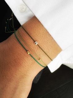 This silk string bracelet is made from silk cord and solid 14K gold, sterling silver, or  24K gold bead. Waterproof silk let you wear bracelet all the time without taking off.  Protection  bracelet is a beautiful way to give someone you care.  It is perfect gift for sister or for couple too. You can choose men size in personalization section.  Details:  * 14K solid gold, sterling silver or 24K gold vermeil bead 2 or 3 mm. Silk String * Adjustable clasp gold vermeil; 🎁 READY AS A GIFT! GIFT MESSAGE AVAILABLE (please write the message in the comments field)  It comes with beautiful packaging box.  Bracelet is adjustable, so it will fit for everyone. If you need man size, leave me a note. Thank you for shopping at Therapy handmade accessories! Selling Bracelets, Bracelet Packaging, Dragon Year, Silk Bracelet, Good Luck Bracelet, Bracelet Box, Diy For Men, Bracelet Friendship, Silver Bead Bracelet