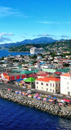 an aerial view of a city by the ocean