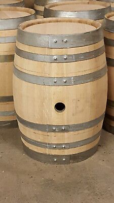 several wooden barrels stacked on top of each other