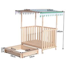 a wooden baby crib with a pink and white canopy