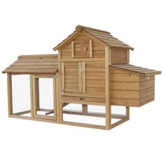 a wooden chicken coop with two chickens inside