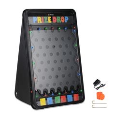 PRICES MAY VARY. [Eye-Catching & LED Lighted]: WinSpin Medium-Sized Prize Drop Game Board comes with an eye-catching design with multi-colored twinkling LED lights to draw crowds and liven up the atmosphere in any occasions, great for commercial use such as in trade shows, trade fairs, holiday events, carnivals, etc. [Customizable Games]: Comes with 1 top logo area and 6 prize slots with writable cards for designing rules and prizes, allowing for redesign of the game board to fit different needs Culinary Classroom, Plinko Board, Light Filtering Blinds, Design Rules, Carnival Games, Carnival Party, Holiday Activities, Activity Games, Party Card