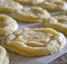 freshly baked cookies are lined up on a baking sheet