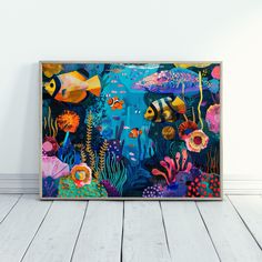 a painting on the wall with fish and corals in blue, pink, yellow and orange colors