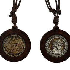 two necklaces with different designs on them