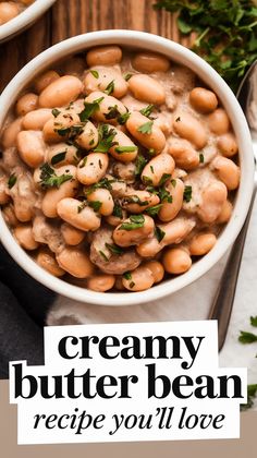 a white bowl filled with creamy butter bean soup