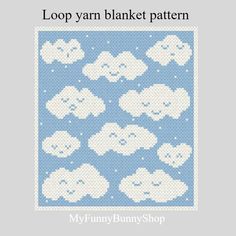 a blue and white knitted pattern with sheeps on it, the text loop yarn blanket pattern