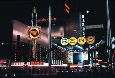 the neon signs are lit up at night in las vegas, n y c's