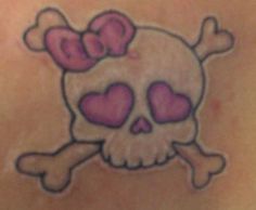 a skull and crossbones with hearts on it