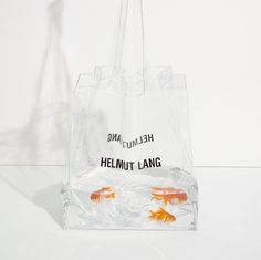 Limited Edition HELMUT LANG PVC Bag  AVAILABLE TO THE FIRST 100 SHOPPERS IN OUR NY AND LA STORES  821 WASHINGTON ST, NY  8808 MELROSE AVE, WEST HOLLYWOOD Vintage Chic Fashion, Clear Tote Bags, Pvc Bag, Transparent Bag, Women Bags Fashion, Clear Bags, Bag Packaging, Helmut Lang, Goldfish