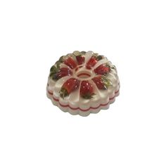 a red and white glass candle holder on a white background with an image of strawberries in the center