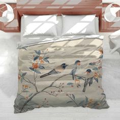 a bed with two birds on it in a room