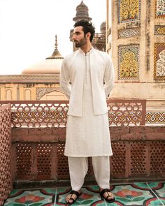 Eid Cotton Silk Bandhgala With Dabka Work, Off White Traditional Wear With Dabka For Designer Occasions, White Embroidered Cotton Silk Bandhgala, Embroidered White Cotton Silk Bandhgala, Traditional Chanderi Sherwani With Naqshi, Elegant White Chanderi Nehru Jacket, White Chanderi Bandhgala With Cutdana, White Cotton Silk Bandhgala With Resham Embroidery, Festive White Cotton Silk Sherwani