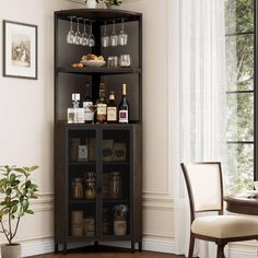 a wine rack with bottles and glasses on it in the corner of a dining room