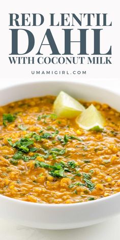 red lentil dall with coconut milk and cilantro in a white bowl