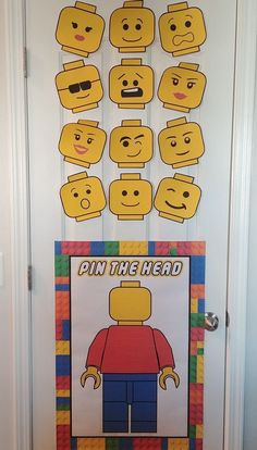 the door is decorated with legos and paper cutouts to look like people's faces