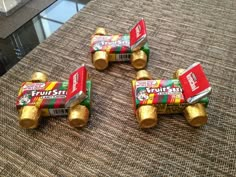 four pieces of candy sitting on top of a table