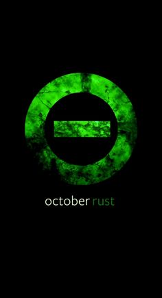 a green circle with the word october rust written in white on it, against a black background